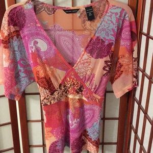 Sheer v-neck blouse. Beaded front. Ties in back!